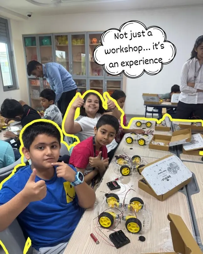 Students showing their robotics project